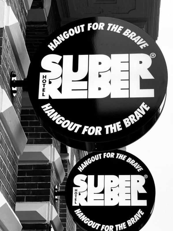 Hotel SUPERREBEL® — Hangout for the brave signs